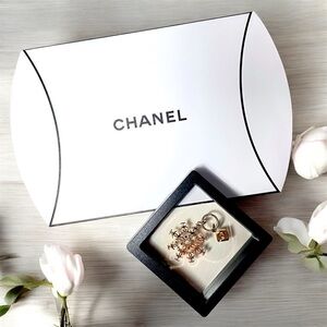Chanel Gold Snowflake and Square Chanel Logo Charm With Box